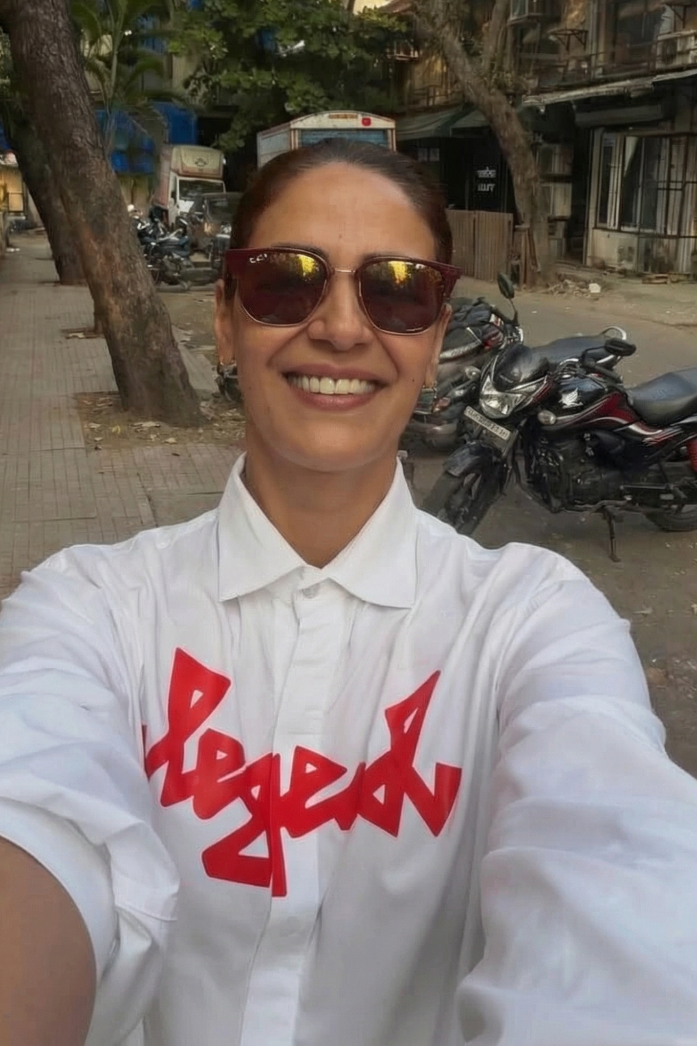 MONA SINGH IN WHITE LEGEND SHIRT